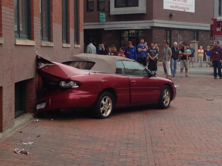 The car hit the side of the Lafayette Building on Congress Street. Photo courtesy of WCSH6