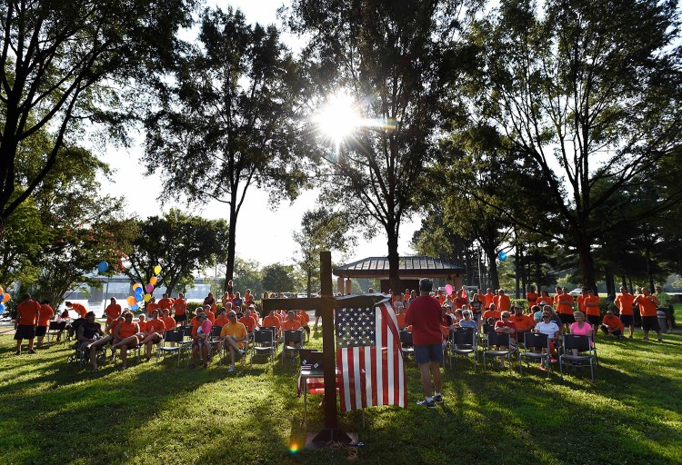 Members of Teen Challenge, gather for a memorial service at River Park on Saturday in Chattanooga, Tenn., for the victims of the shootings. Muhammad Youssef Abdulazeez of Hixson, Tenn., attacked two military facilities Thursday in a shooting rampage that killed four Marines and one Navy sailor. The Associated Press