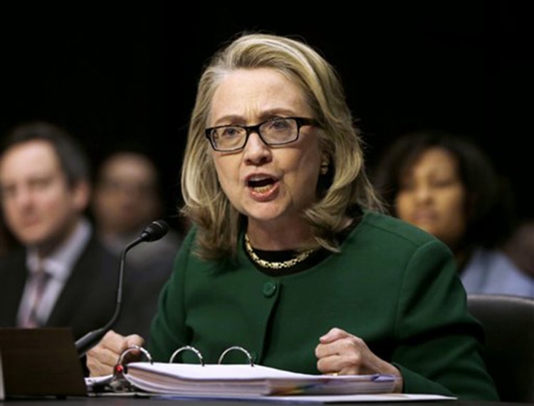 Then-Secretary of State Hillary Clinton testifies on Capitol Hill on Jan. 23, 2014, before the Senate Foreign Relations Committee hearing on the deadly attack on the U.S. diplomatic mission in Benghazi, Libya. The Associated Press