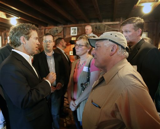 Republican presidential candidate Sen. Rand Paul, R-Ky., speaks with voters during a campaign stop the Snow Shoe Club on June 6 in Concord, N.H.  Paul is campaigning in the nation's earliest  presidential primary state.