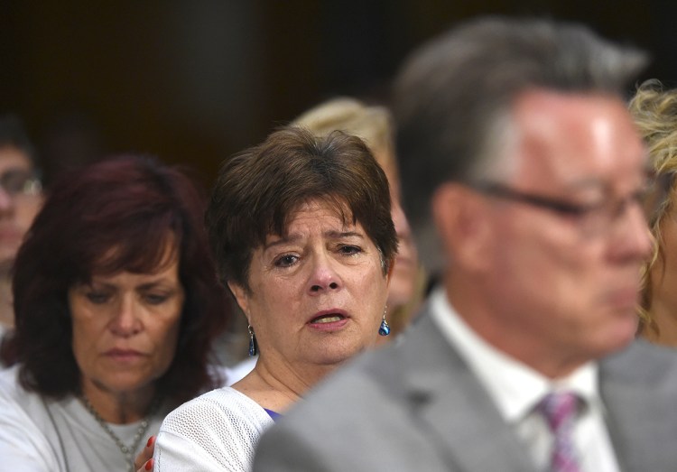 Liz Sullivan, mother of Kathryn Steinle, who was killed on a San Francisco pier, allegedly by a man previously deported several times, listens to testimony July 21 during a Senate Judiciary hearing to examine federal immigration enforcement policies.