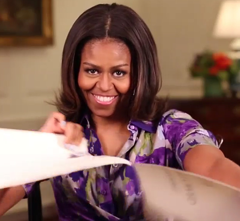 In this screen image from an Instagram video posted by first lady Michelle Obama she tears a placard that reads "No Photos or Social Media Allowed" that used to be  displayed in the White House.