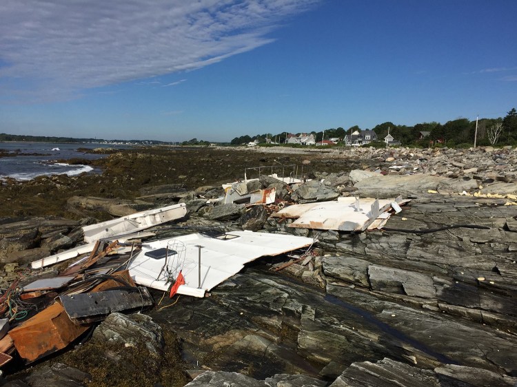 The remains of a drifting boat litter the rocky shore of Peaks Island Wednesday. Photo courtesy of Jim Memmott