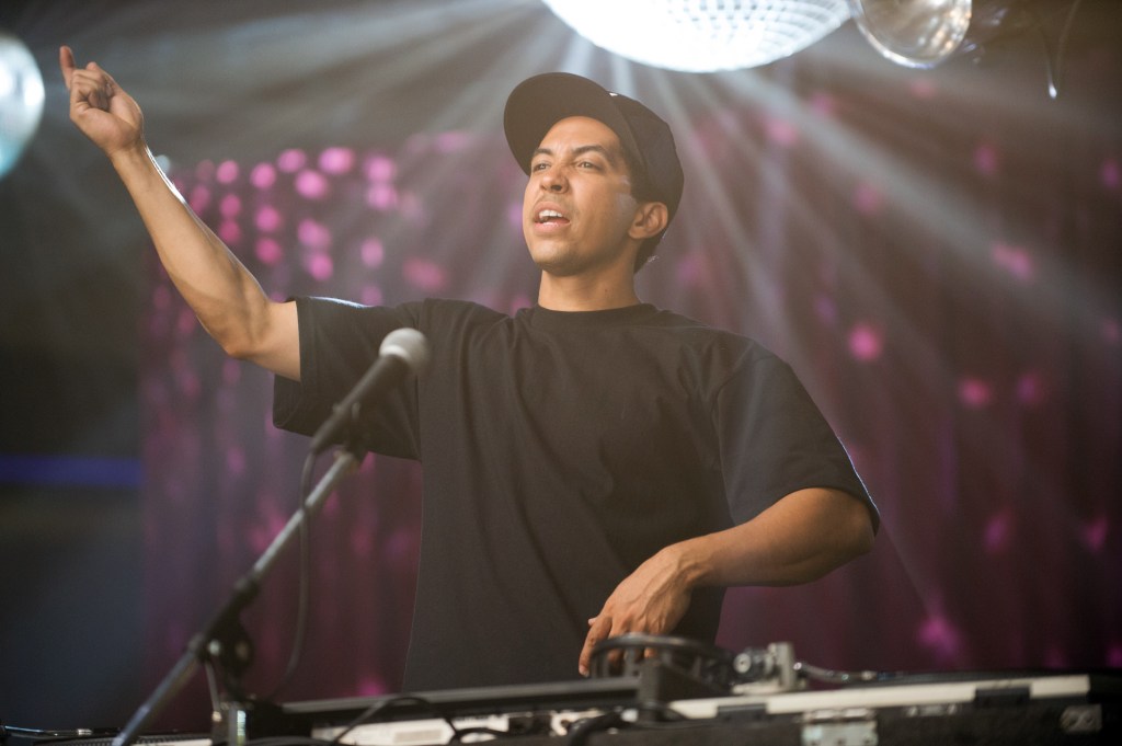 This photo provided by Universal Pictures shows, Neil Brown, Jr., as DJ Yella, in a scene from the film, Straight Outta Compton." The movie releases in U.S. theaters on Aug. 14, 2015. (Jaimie Trueblood/Universal Pictures via AP)
