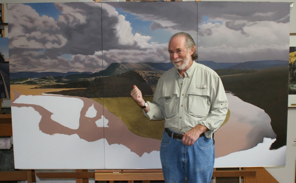 Tom Crotty, who was known for his realistic seascapes and winter scenes, is shown with a work in progress in Santa Fe, New Mexico, in 2003.