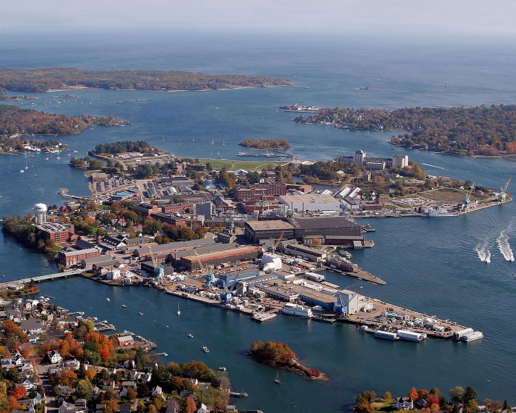 An aerial view of the Portsmouth Naval Shipyard in Kittery. Civilian federal workers, such as those who work at the shipyard, might be furloughed if the government shuts down this weekend.