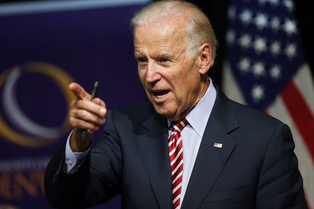 In this July 21, 2015, file photo, Vice President Joe Biden speaks during a roundtable discussion at the Advanced Manufacturing Center at Community College of Denver.