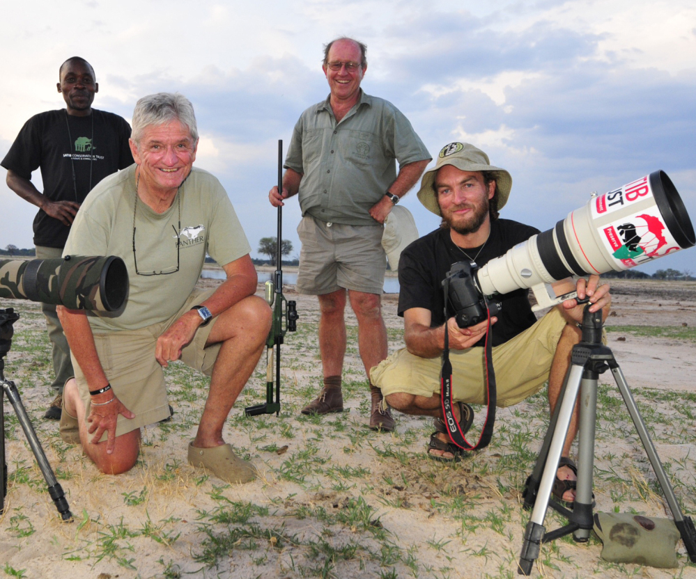 Brent Stapelkamp, front right, shown with colleagues in Hwange National Park in Zimbabwe, is part of a team that had tracked and studied Cecil the lion for nine years.