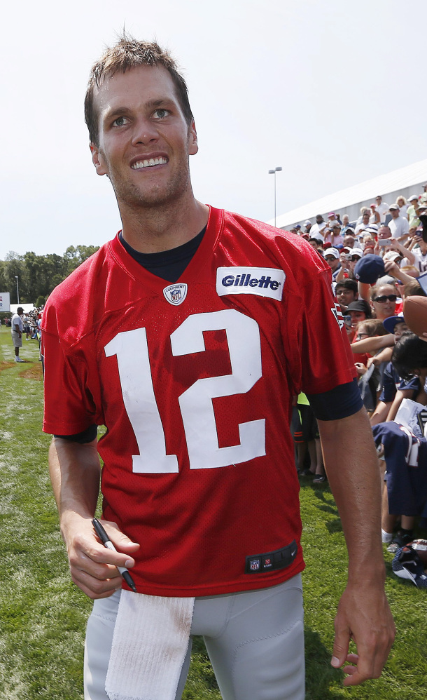 New England quarterback Tom Brady was all smiles  and as popular as ever during a training camp session on Saturday in Foxborough, Mass.
