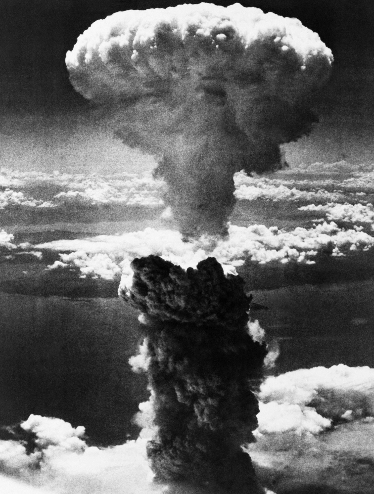 A mushroom cloud rises after the atomic bomb was dropped on Nagasaki, Japan, on Aug. 9, 1945, immediately killing 73,000.
