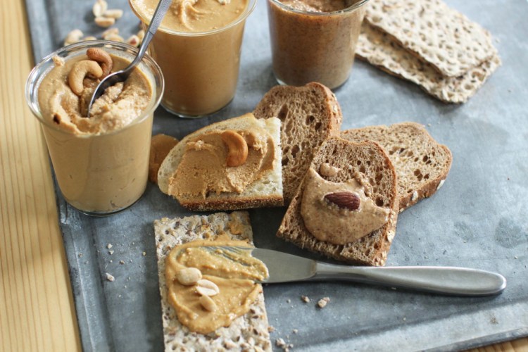 Clockwise from bottom: Homemade peanut butter, cashew butter and almond butter.
