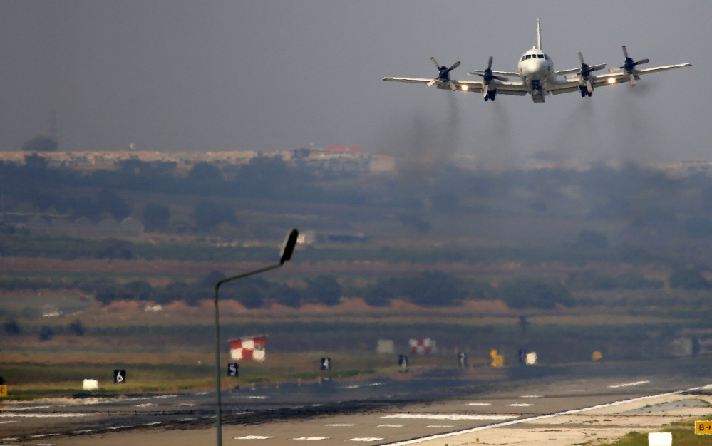 A U.S. Navy airplane takes off from the Incirlik Air Base on the outskirts of the city of Adana, southern Turkey, on Friday.
