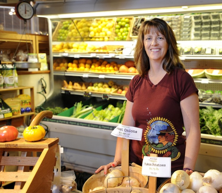 Tina Wilcoxson, owner of Royal River Natural Foods in Freeport, is one of five finalists for an award that honors retailers who get involved with public policy discussions.