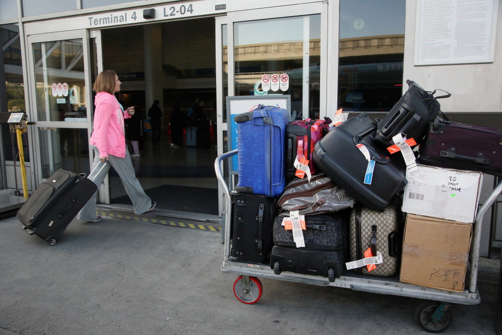 The report says there appears to be no justification for checked bag fees other than increased profit.