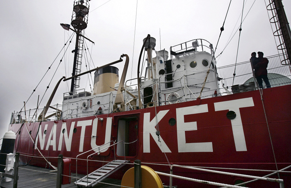 The Nantucket Lightship sits anchored at Rowes Wharf in Boston. Its powerful beacon was lit for about two minutes for the first time in 40 years Friday and then powered down again. The lightship operates as a museum.