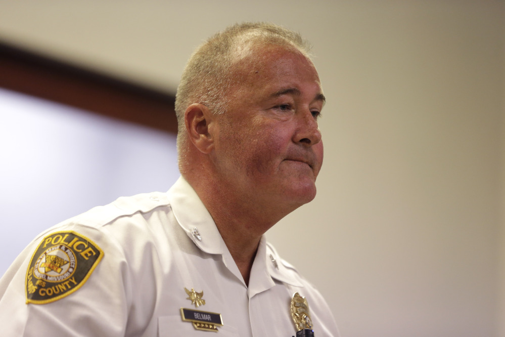 St. Louis County Police Chief Jon Belmar speaks during a news conference Monday. He said a teenager fired on police Sunday during a protest on the anniversary of the death of Michael Brown in Ferguson, Mo. Police returned fire and the teenager was taken to a hospital.