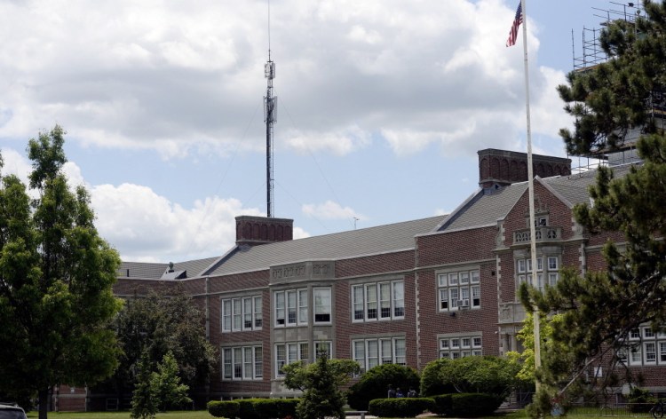 A cell tower at Deering High School has caused health concerns among some teachers. An advocate for its removal says the school district needs to adopt a policy on towers.