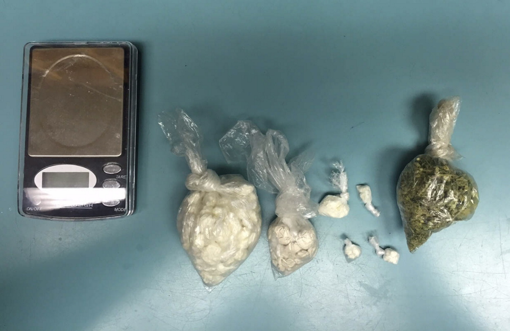 Some of the items and drugs seized by Scarborough police and federal Drug Enforcement Administration agents Tuesday.