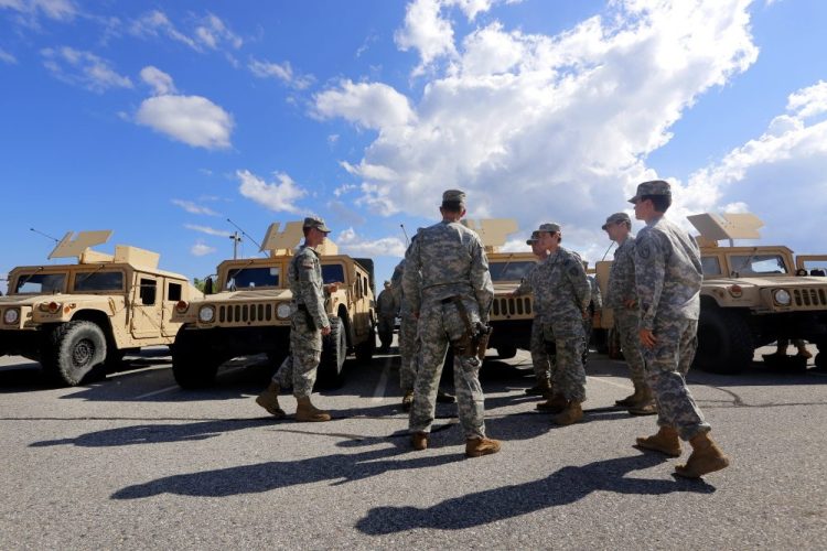A group of soldiers convenes at the training location Wednesday.
Derek Davis/Staff Photographer