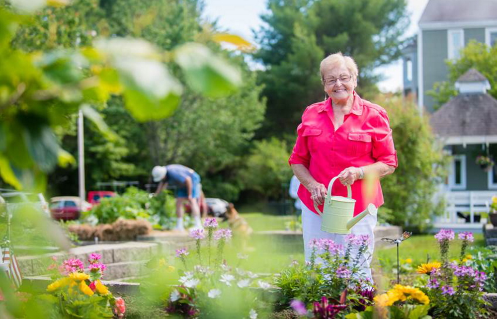 Marilyn Crandlemire, a resident of The Highlands retirement community, which has 15 raised beds and plans in the works to create a community plot next year.