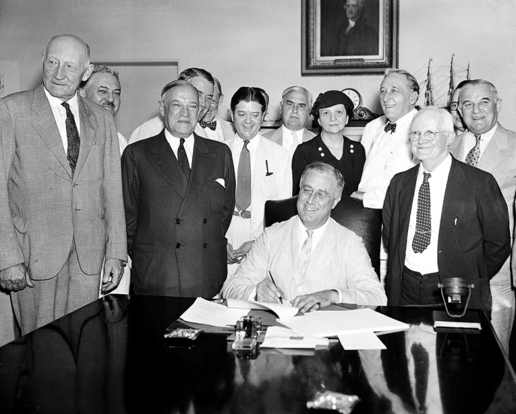 President Franklin Roosevelt signs the Social Security Bill in Washington on Aug. 14, 1935. The retirement fund has enough money to pay full benefits until 2035. But once the fund is depleted, the shortfalls will be enormous.