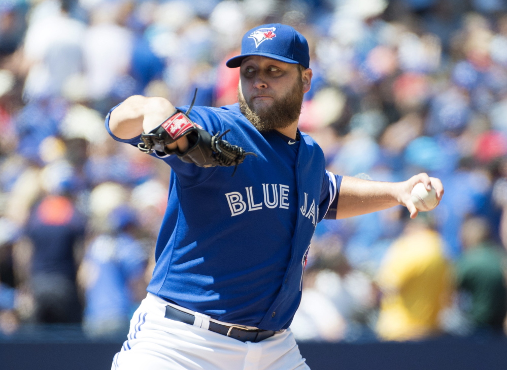 Toronto’s Mark Buehrle worked into the eighth inning Thursday during the Blue Jays’ 4-2 home victory over Oakland that pushed their winning streak to 11 games.