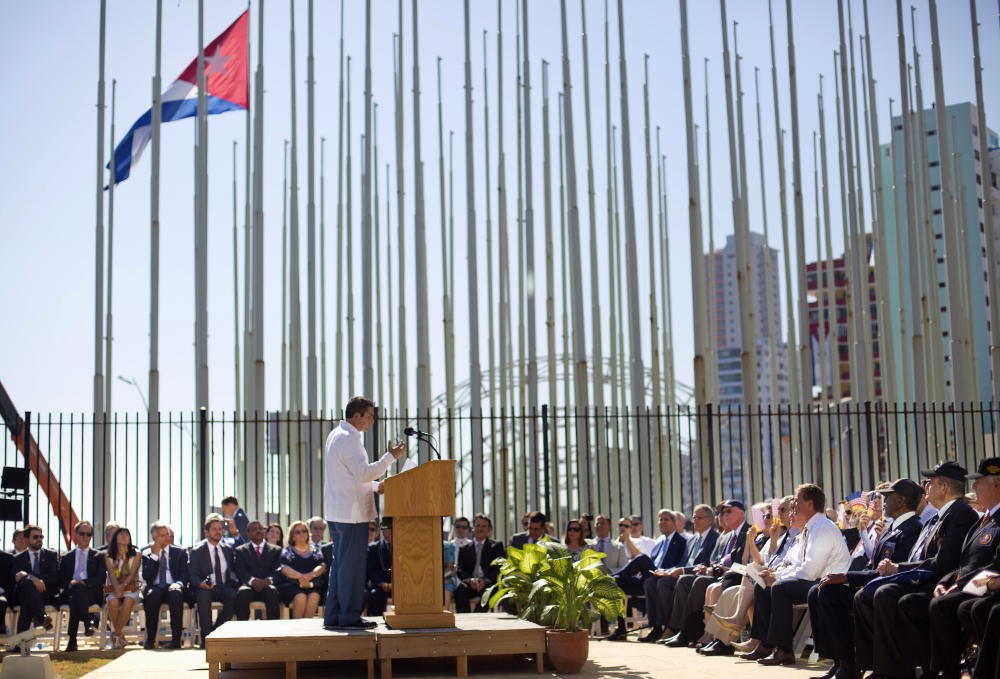 Cuban-American poet Richard Blanco reads his poem Friday during the reopening ceremony of the U.S. embassy in Havana. Blanco, who lives in Bethel, Maine, said he hopes his poem will spur Cubans to reunite emotionally after years of separation.