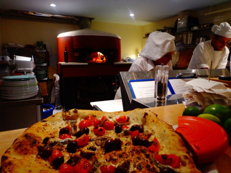 The wood-fired pizza is the draw at Meanwhile, the casual restaurant opened in March in Belfast by Alessandro Scelsi and Clementina Senatore.