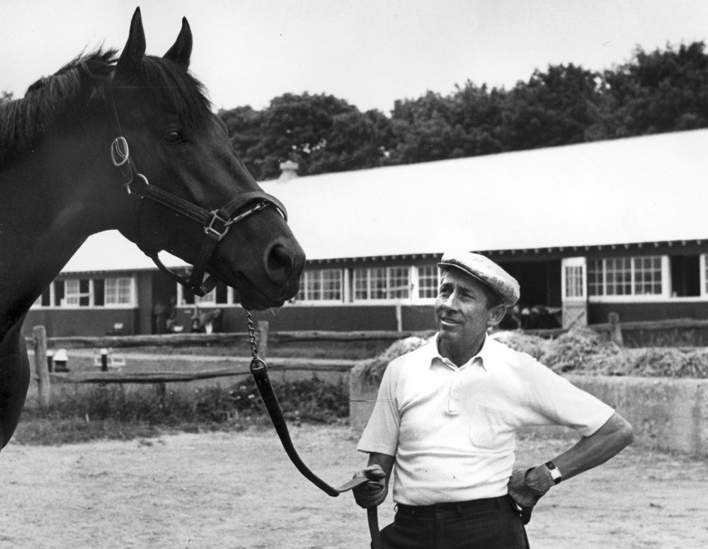 John Nerud poses with Dr. Fager, the first to win four championships in one year. In 1968, Dr. Fager was champion top sprinter, turf horse and handicap horse and Horse of the Year.