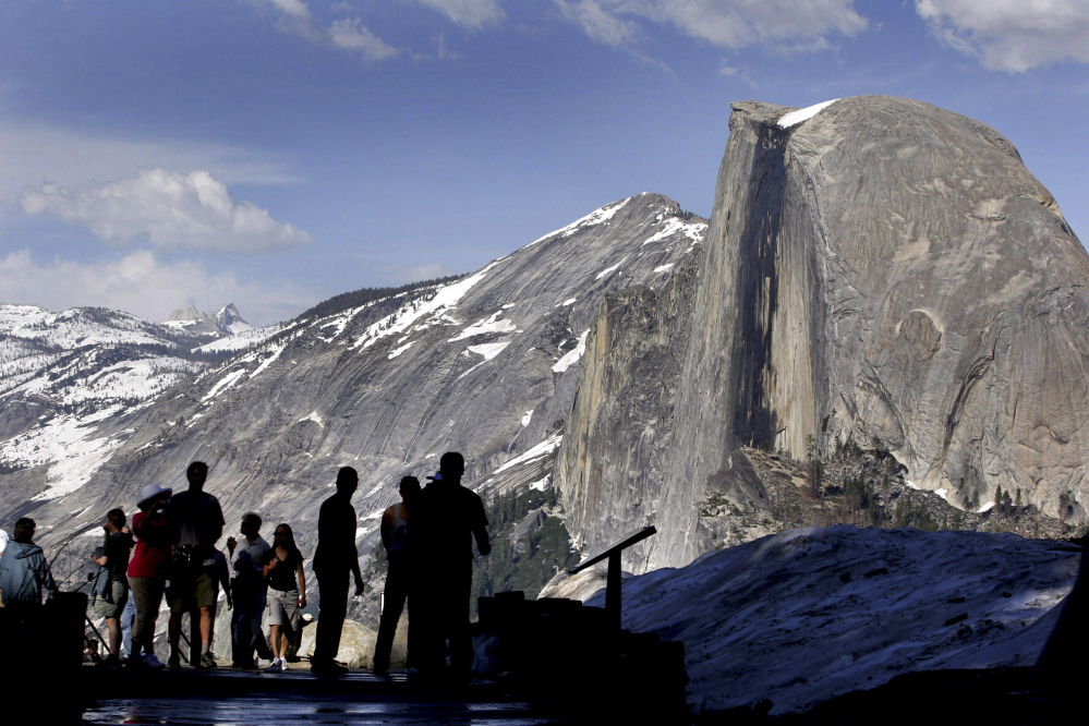 Officials say an oak tree limb fell on a tent in the heart of Yosemite National Park, killing two young campers early Friday morning.