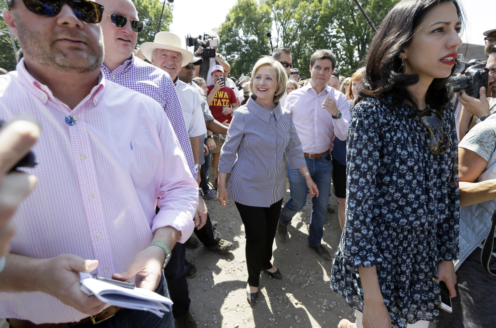 Democratic presidential candidate Hillary Rodham Clinton walks down the concourse during a visit to the Iowa State Fair on Saturday. The Associated Press