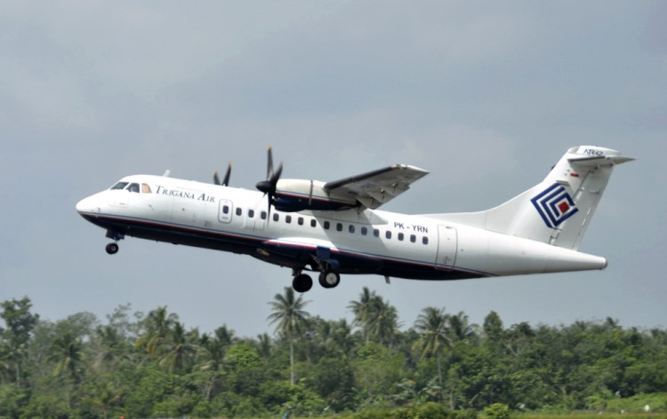 A Trigana Air Service ATR42-300 twin turboprop plane takes off at Supadio airport in Pontianak, West Kalimantan, Indonesia, in 2010.