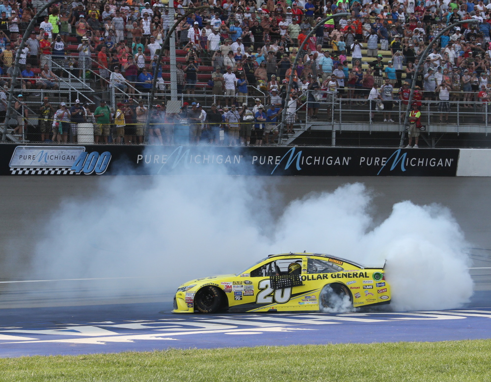 Matt Kenseth celebrates after winning the Sprint Cup race on Sunday at Michigan International Speedway. It was Kenseth’s third win of the season.
