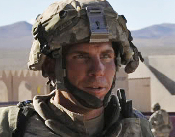 A military investigation said Staff Sgt. Robert Bales exhibited warning signs of violence, but not that he was capable of a large-scale atrocity.