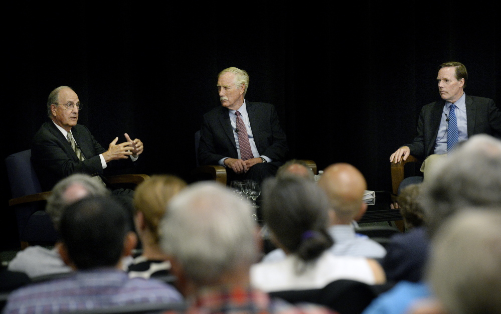 Left to right, former U.S. Sen. George Mitchell, U.S. Sen. Angus King and former Ambassador Nicholas Burns discuss the Iran nuclear deal at the University of Southern Maine on Wednesday.