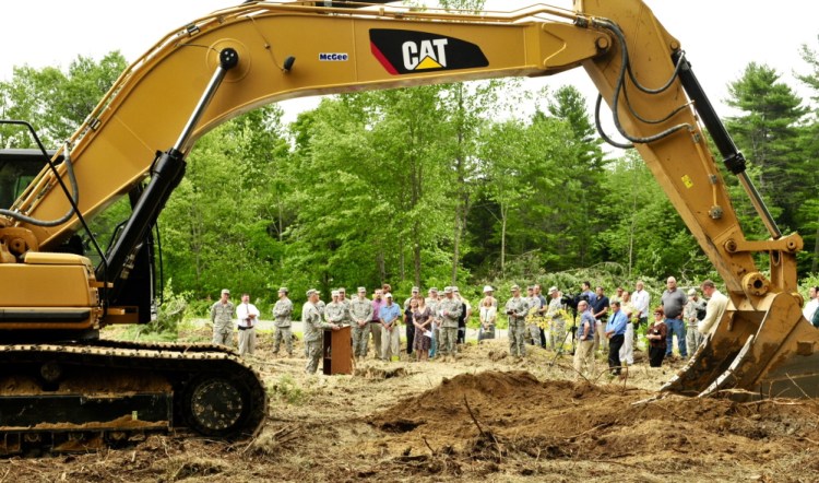 Maine National Guard leaders break ground on the site of their new headquarters near the Maine Veterans Memorial Cemetery off Civic Center Drive during a ceremony Thursday.