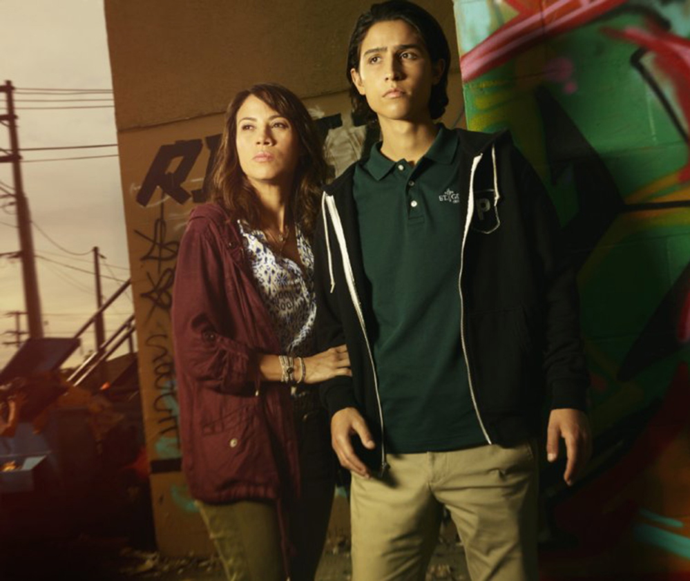 Elizabeth Rodriguez and Lorenzo James Henrie in “Fear the Walking Dead,” which premieres Sunday.