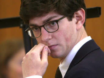 Former St. Paul’s School student Owen Labrie confers with his lawyer during his trial in this Aug. 21, 2015, photo. Labrie was accused of raping a 15-year-old freshman as part of the “Senior Salute,” a practice of sexual conquest.