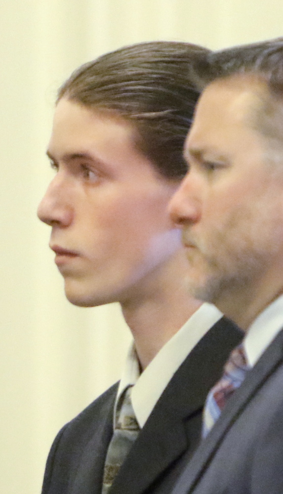 Cameron White left, and attorney Patrick Gordon, appear in York County Superior Court in Alfred on Wednesday. White no longer faces a vehicular manslaughter charge.