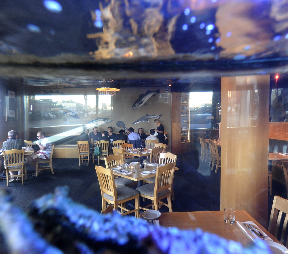 Fish are everywhere at the Old Port Sea Grill – on the walls and in a large tank.