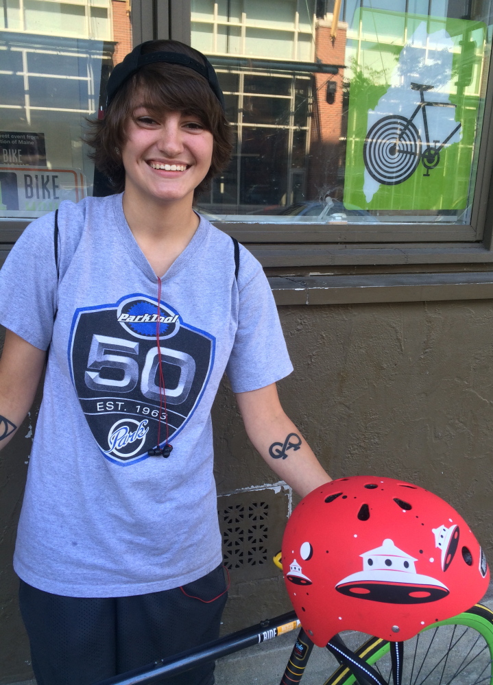 Morgan Mulkern, a bike technician at Ernie’s Cycle Shop in Westbrook, says she feels at home when she’s riding.