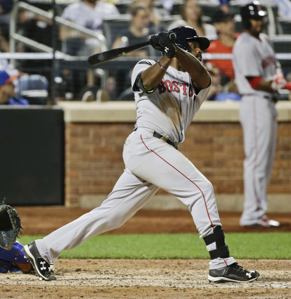 Boston’s Jackie Bradley Jr. hits a two-run home run in the seventh inning to give the Red Sox a 3-2 lead.