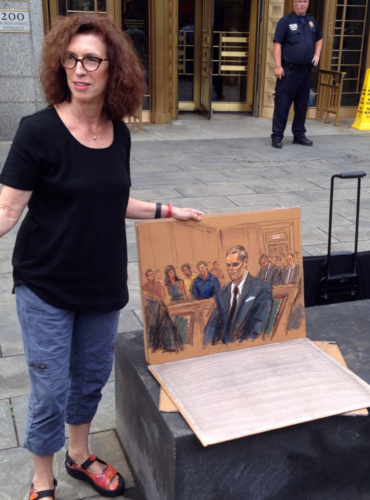 Courtroom sketch artist Jane Rosenberg displays her latest drawing of New England Patriots quarterback Tom Brady outside a federal courthouse in New York on Monday.