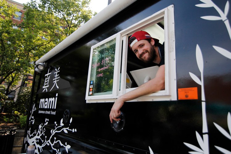Austin Miller and his Mami Japanese food truck in Congress Square in Portland.  Jill Brady/Staff Photographer