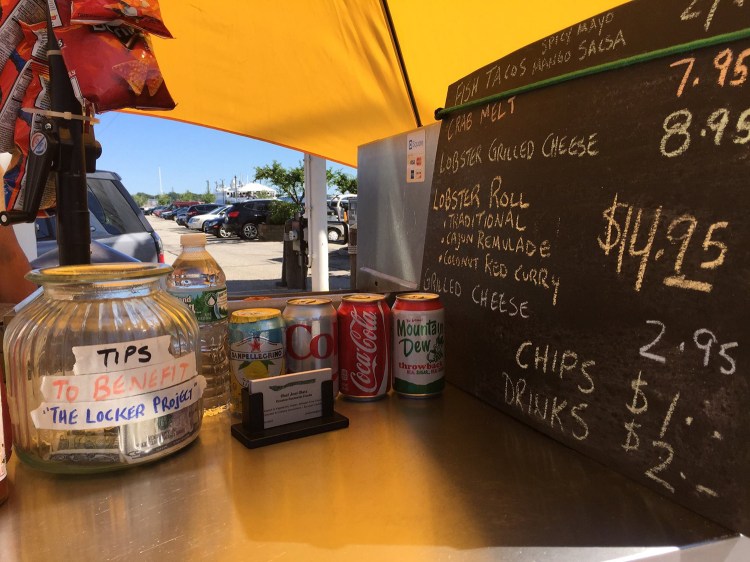 Yellow Cart sells lobster rolls, lobster grilled cheese, crab melts and hot dogs on Commerical Street. Courtesy photo