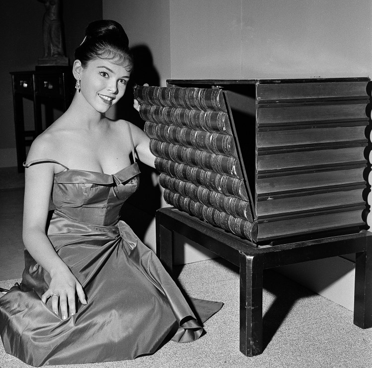 Actress Yvonne Craig poses on the set of "The Gene Krupa Story," in Los Angeles, Calif., July 11, 1959. The Associated Press