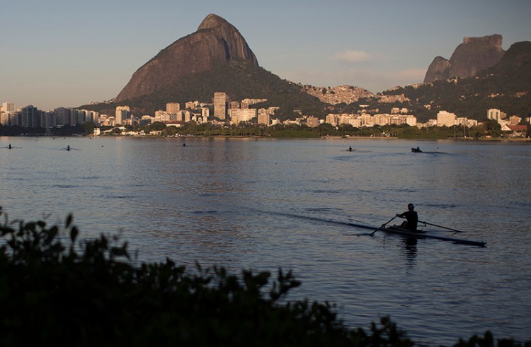 A man rows in the Rodrigo de Freitas Lake in Rio de Janeiro. The water was thought to be safe for rowers and canoers but tests have shown it to be among the most polluted for Olympic sites.
