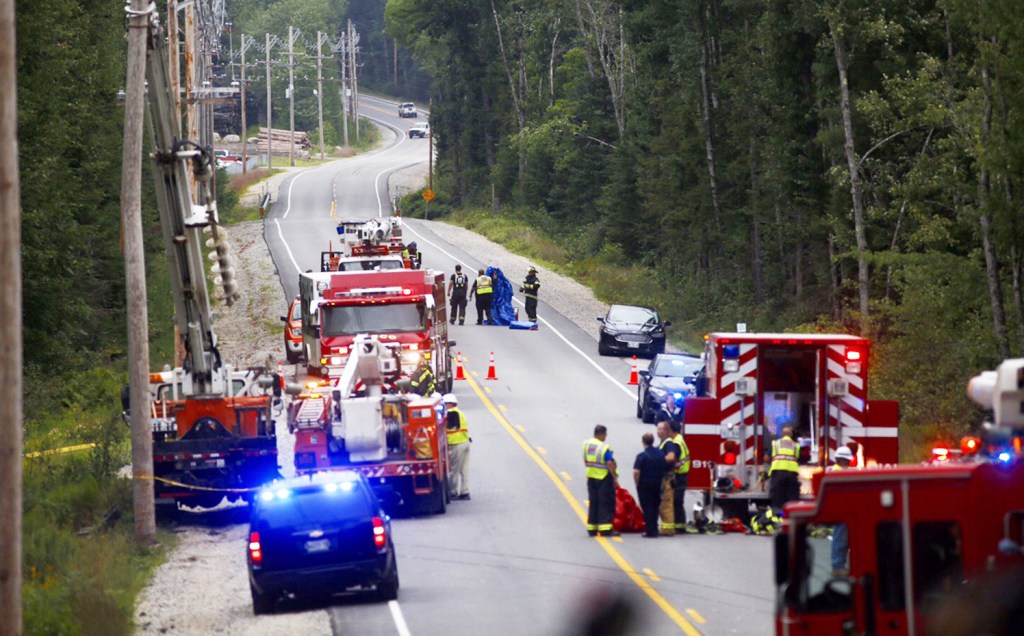 First responders reconstruct the scene of the Aug. 11 crash on Route 11 in Casco that killed a 4-year-old Cameron Joseph Petersen and critically injured his mother, Crystal Petersen, 26, of Gray. 
Gabe Souza/Staff Photographer