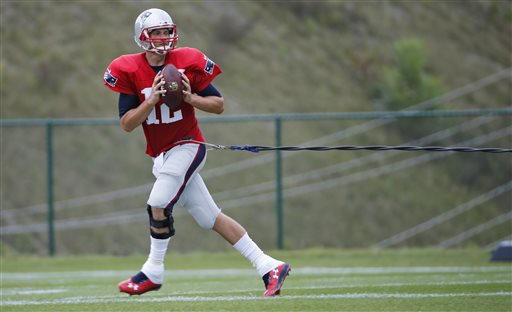 Patriots quarterback Tom Brady runs a drill during a joint practice with the New Orleans Saints in White Sulphur Springs, W.Va., on Thursday. The Associated Press