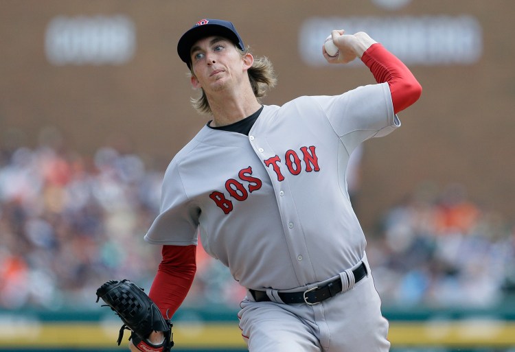 Boston Red Sox starting pitcher Henry Owens throws during the second inning of a baseball game against the Detroit Tigers, Sunday. The Associated Press